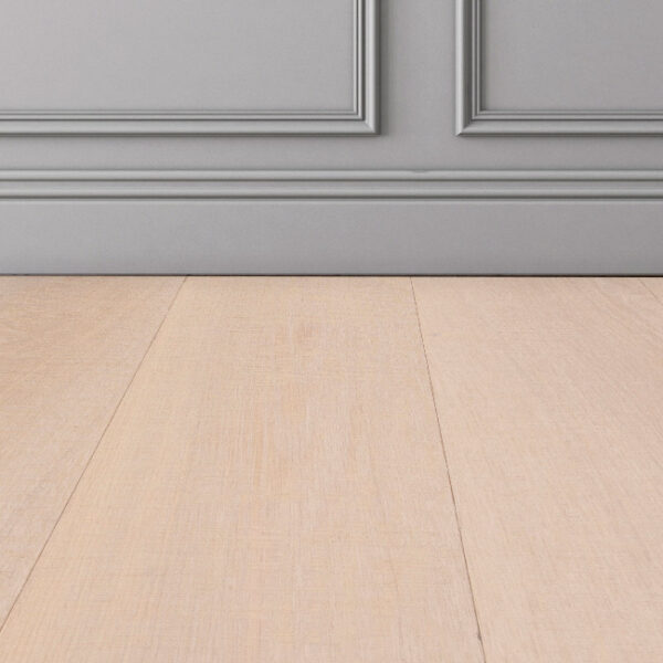 Strand-white-wood-floor-sample-on-grey-wall